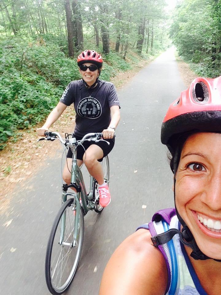 Amy trailing behind Analisse on a bike ride in Cape Cod.