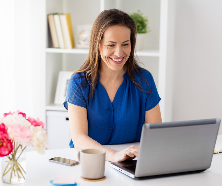 woman at desk with coffee