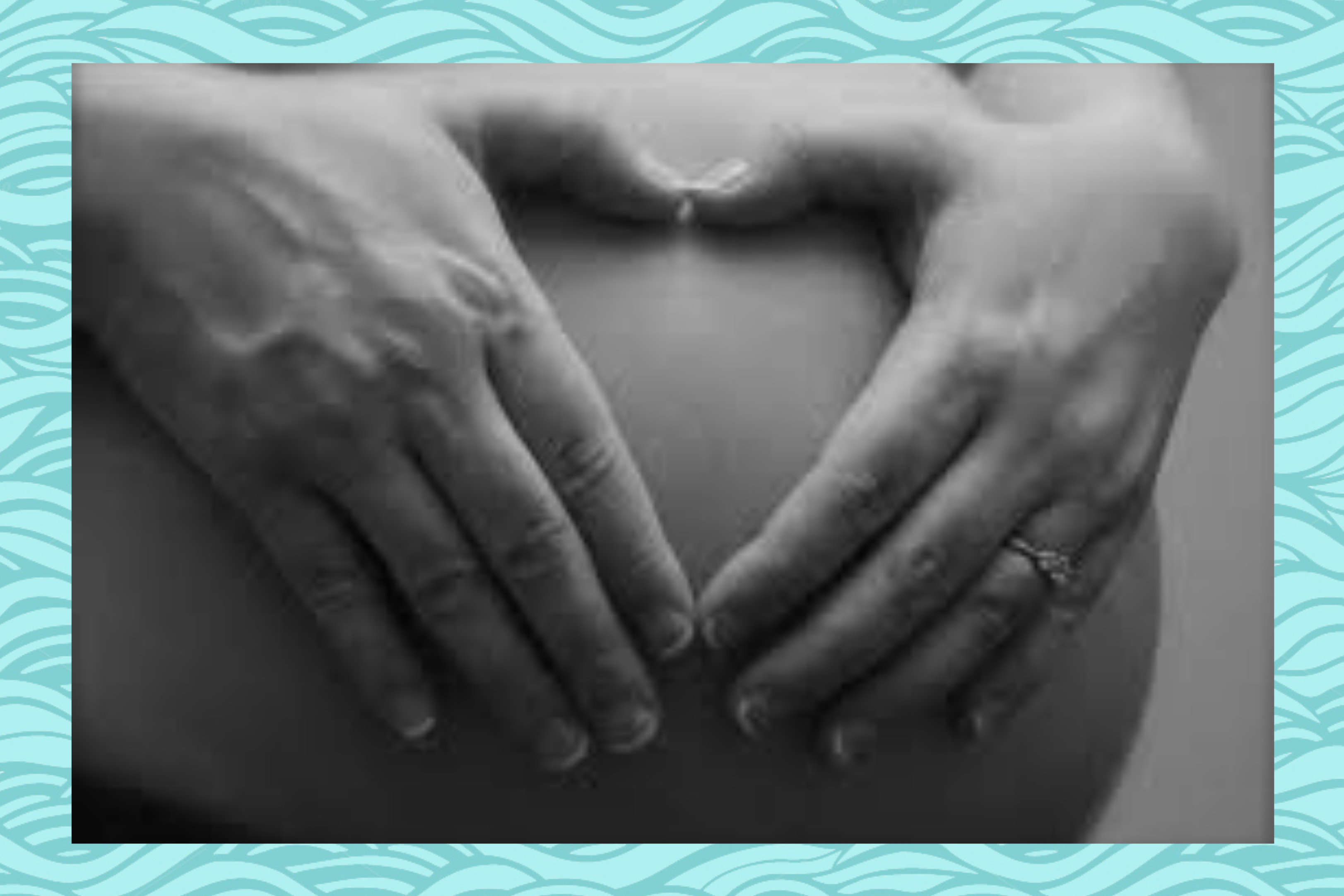 pregnant woman bump heart shape hands