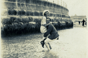 Vintage photo of man and woman in water.