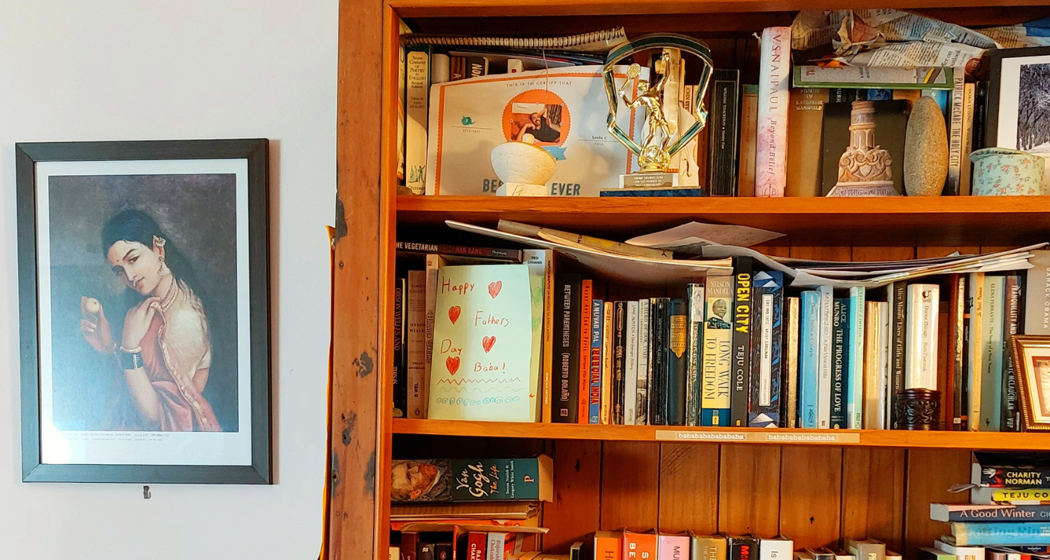 Bookshelf and drawing of Indian woman in Rajorshi Chakraborti