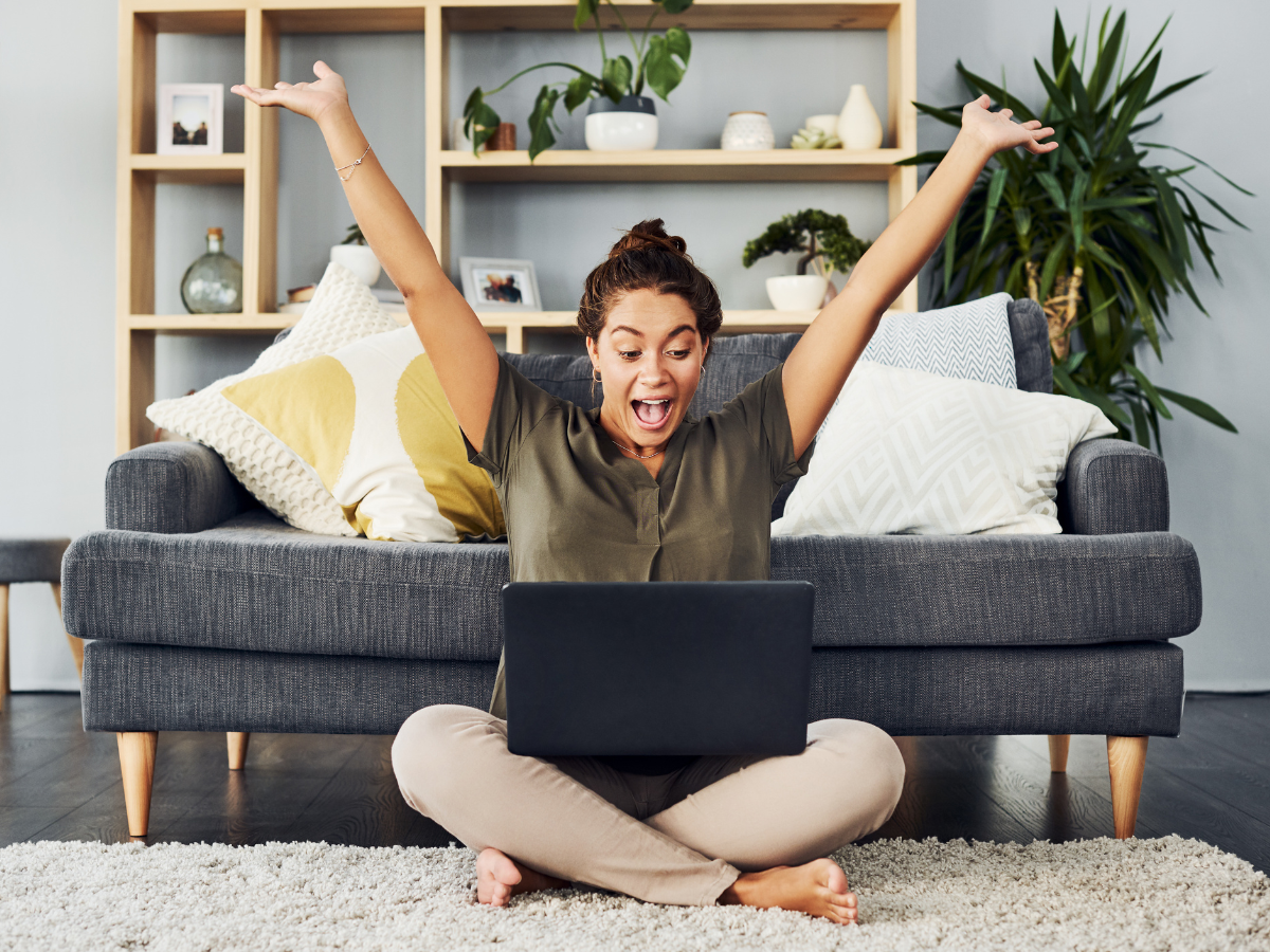 woman excited about affiliate marketing - image via Nicola Katie/Canva Pro 