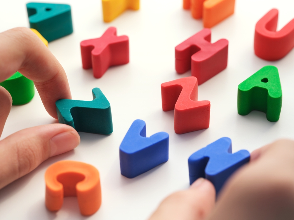 Boy playing wit letters