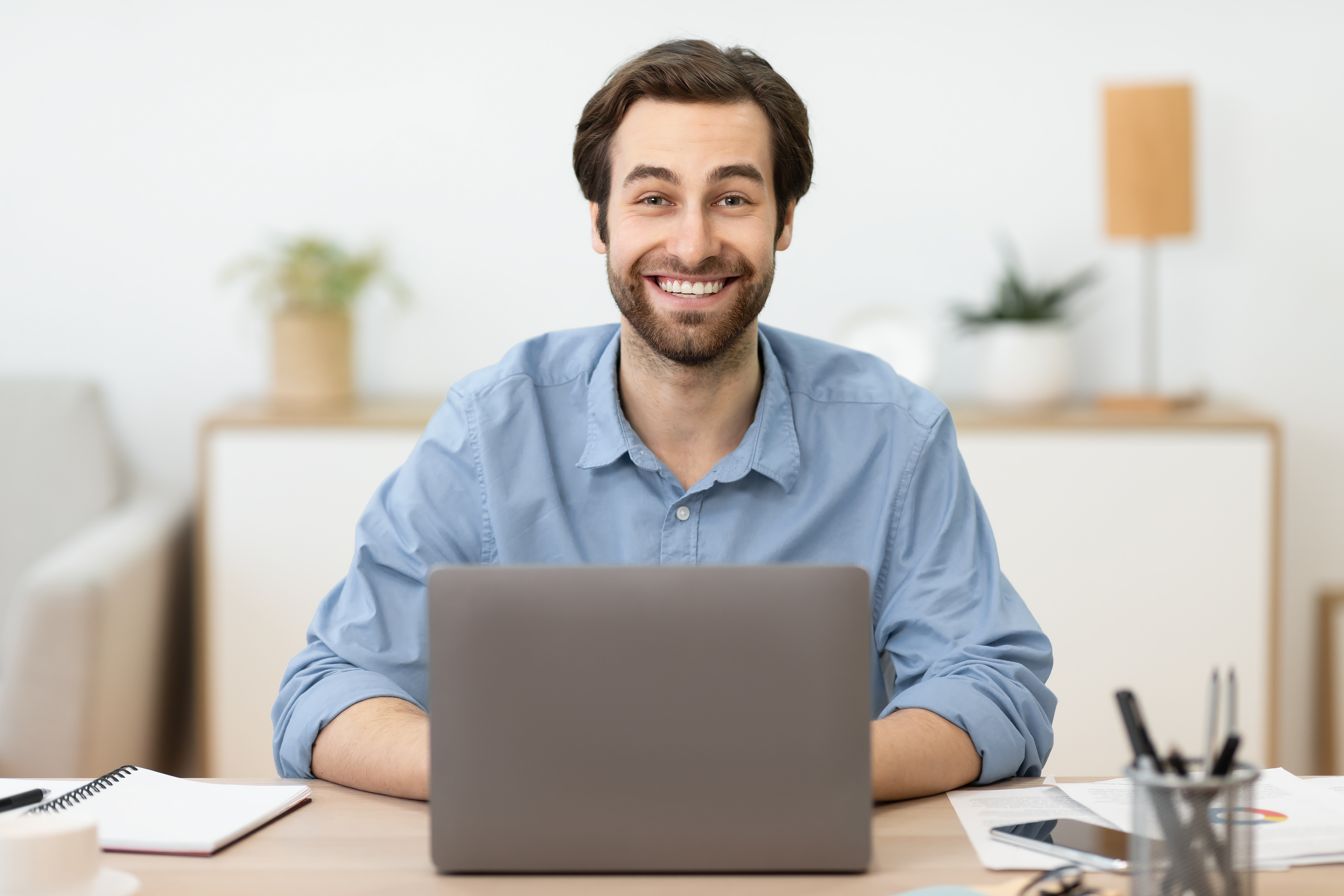 smiling guy laptop