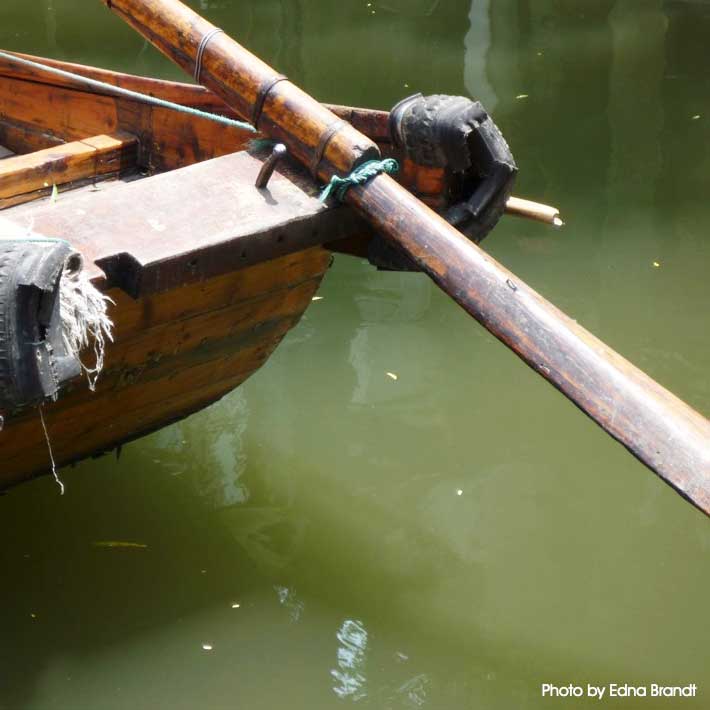 Sculling on a Sampan boat 