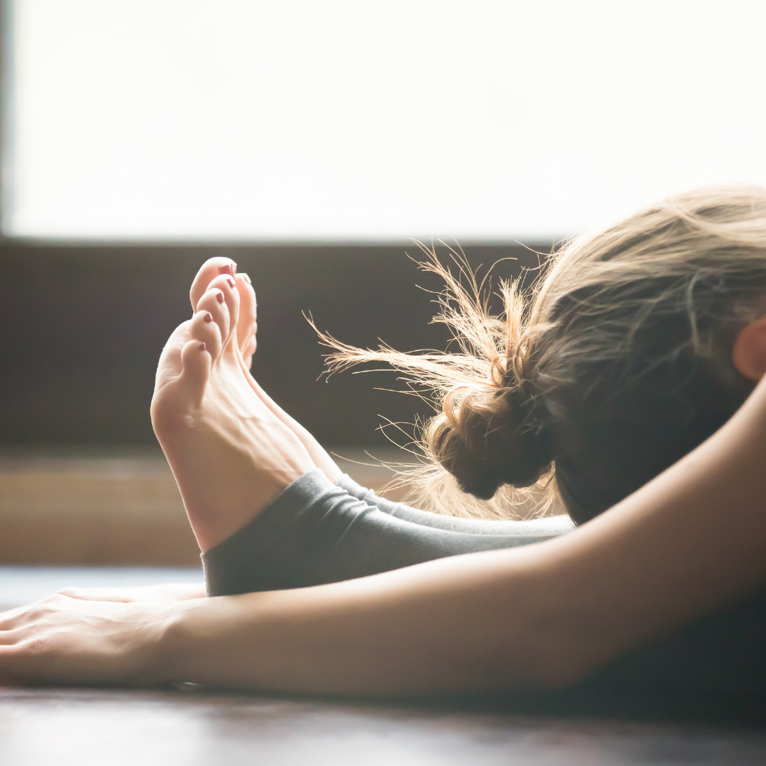 Woman relaxing in a yoga pose