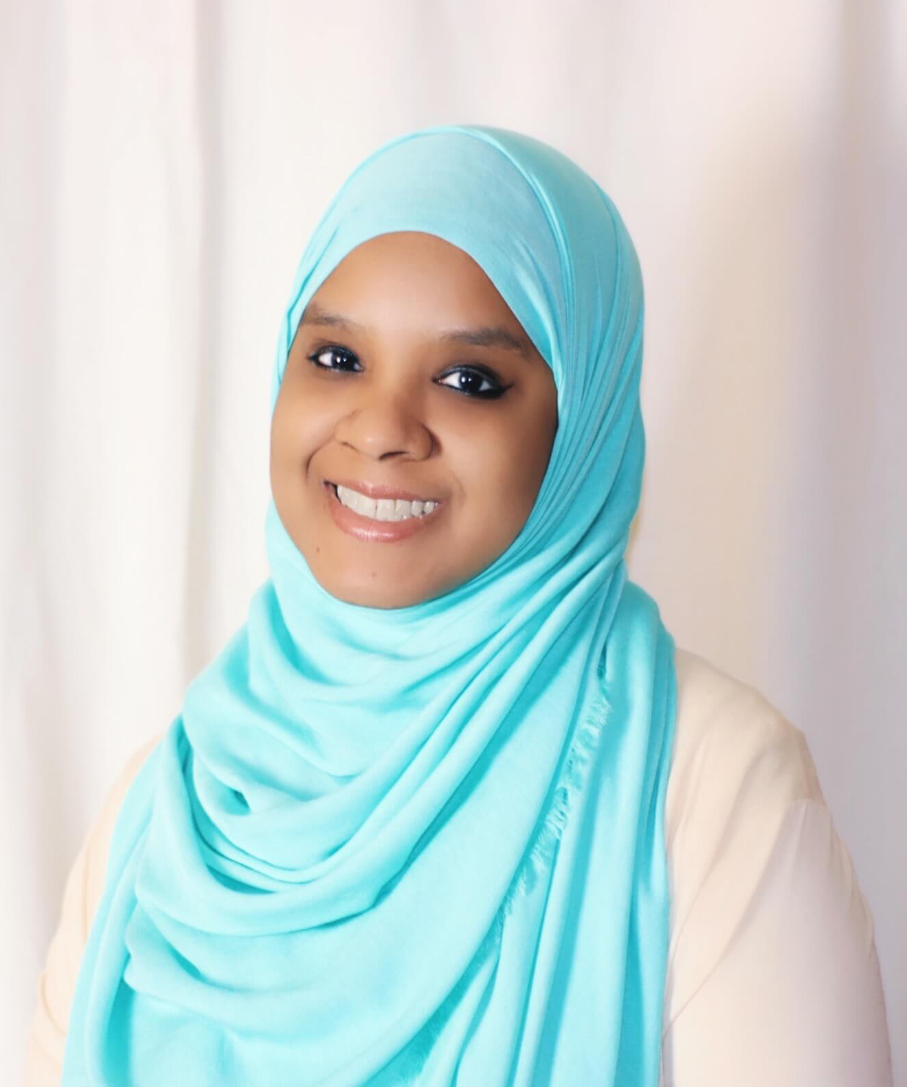 Photo of Umm Zakiyyah in blue hijab