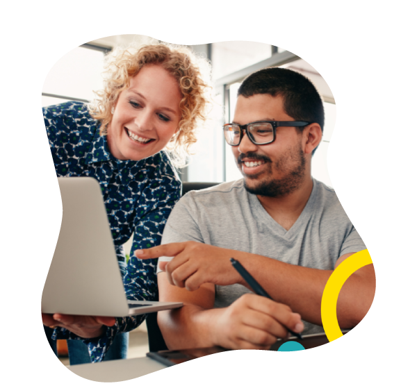 Man and woman looking at screen