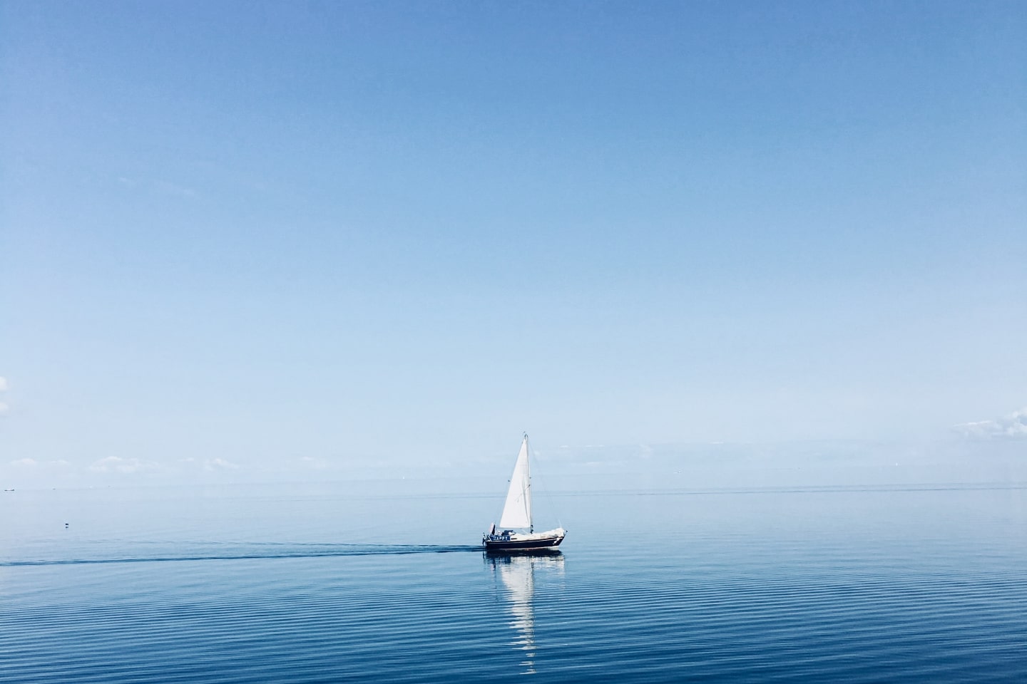 A boat sailing across the ocean
