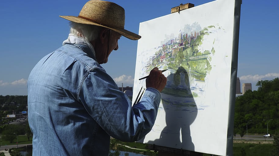 Older man painting