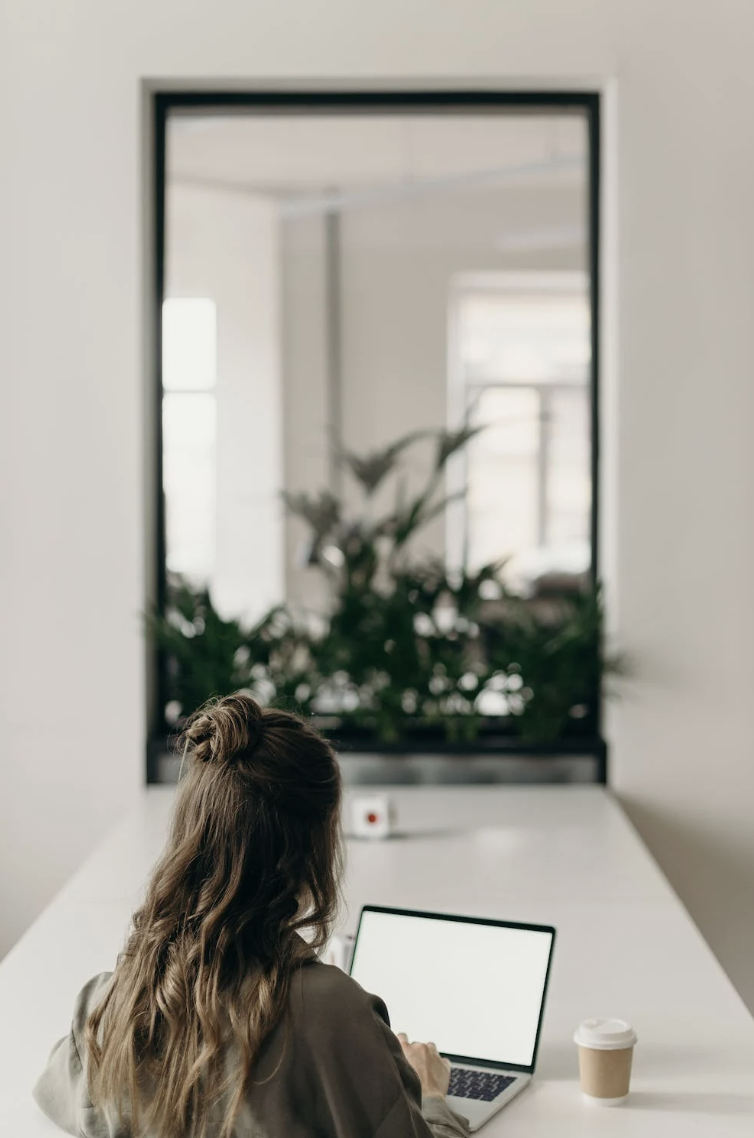 woman learning on laptop