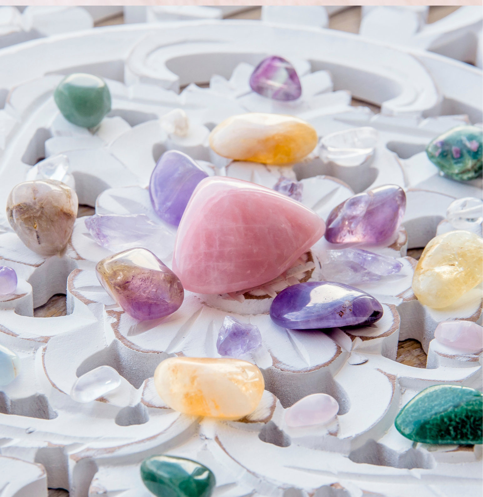 pink and purple crystals on a geometric grid