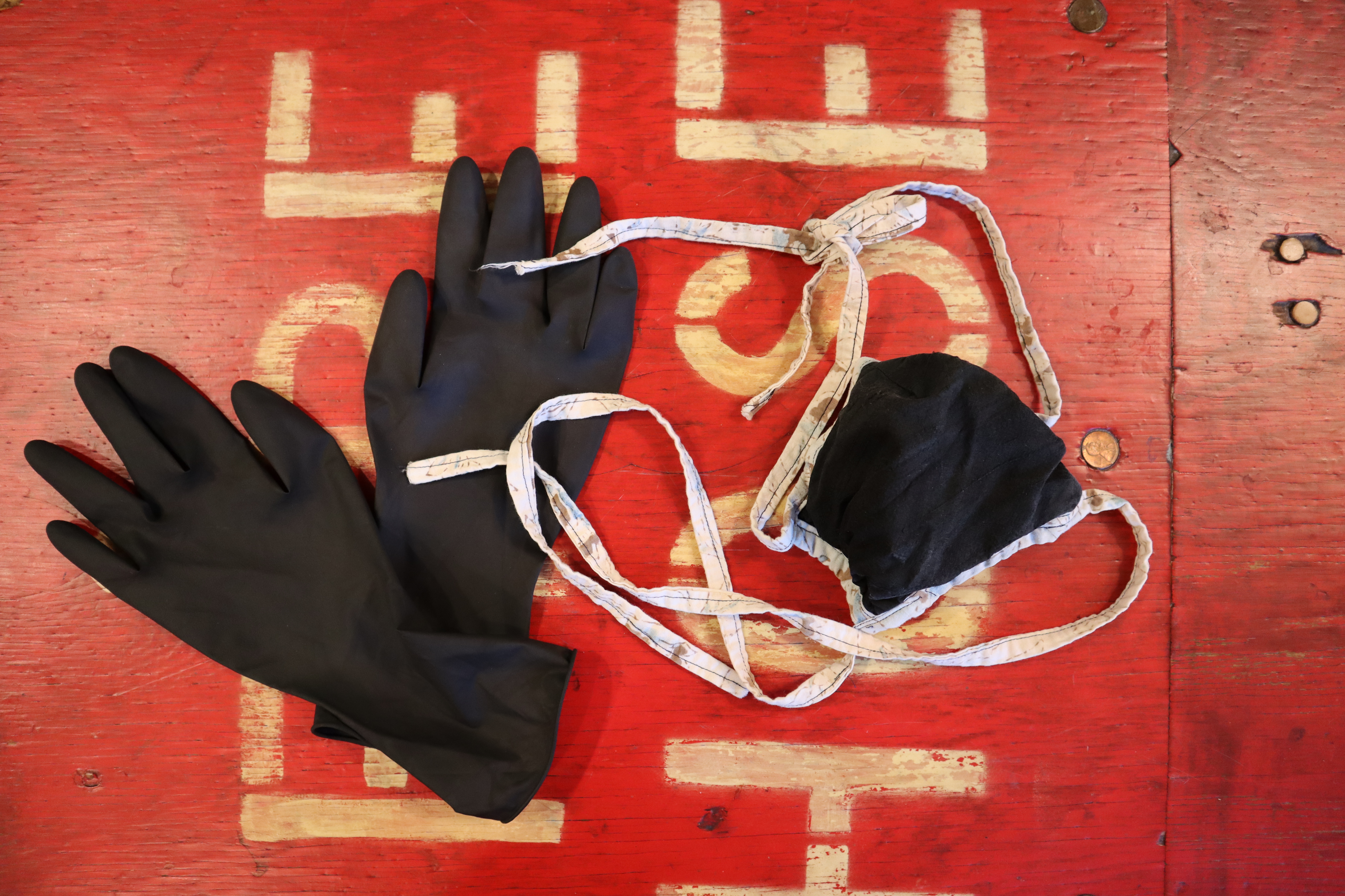 black rubber safety gloves on a table