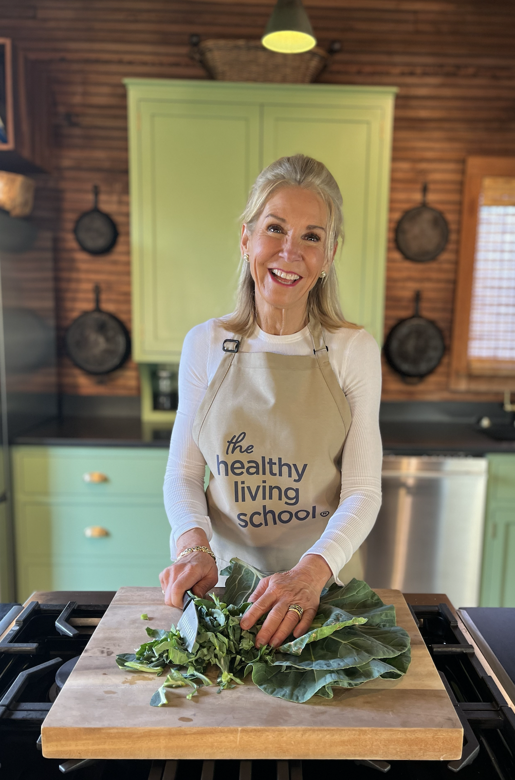 Dr. Ann preparing dark leafy greens