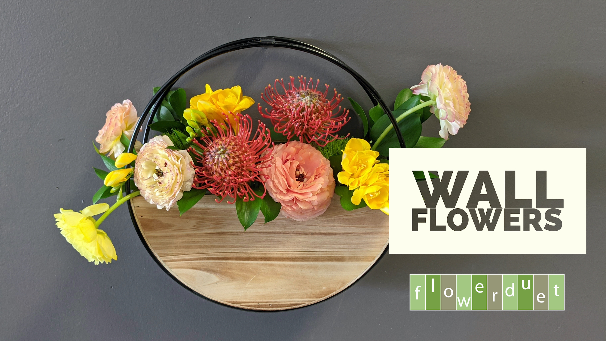 Flowers in a wood circle vase on the wall