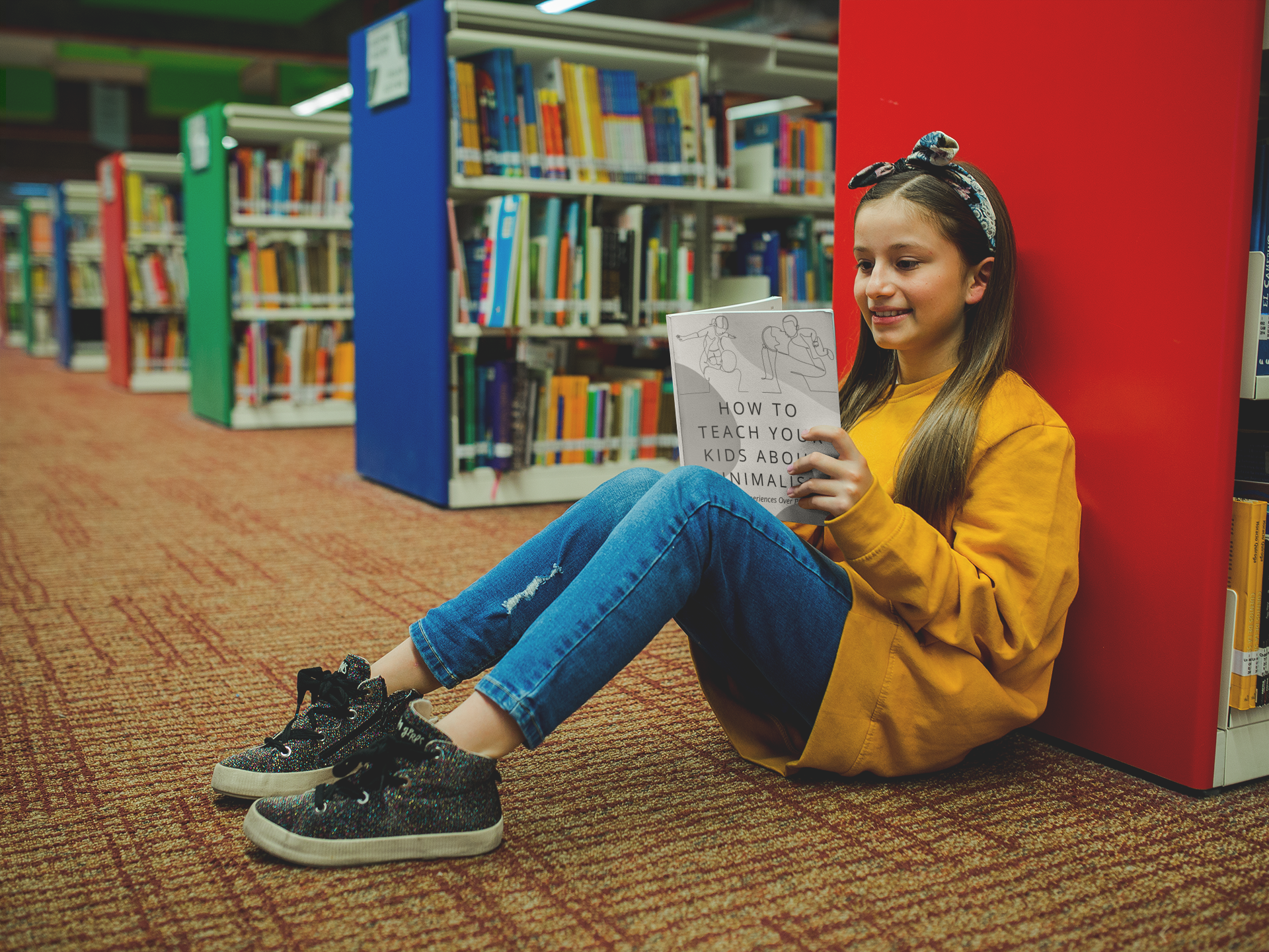 Pre-teen white girl reading a book titled How to Teach Your Kids About Minimalism