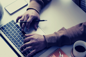 Man Hands at Computer typing