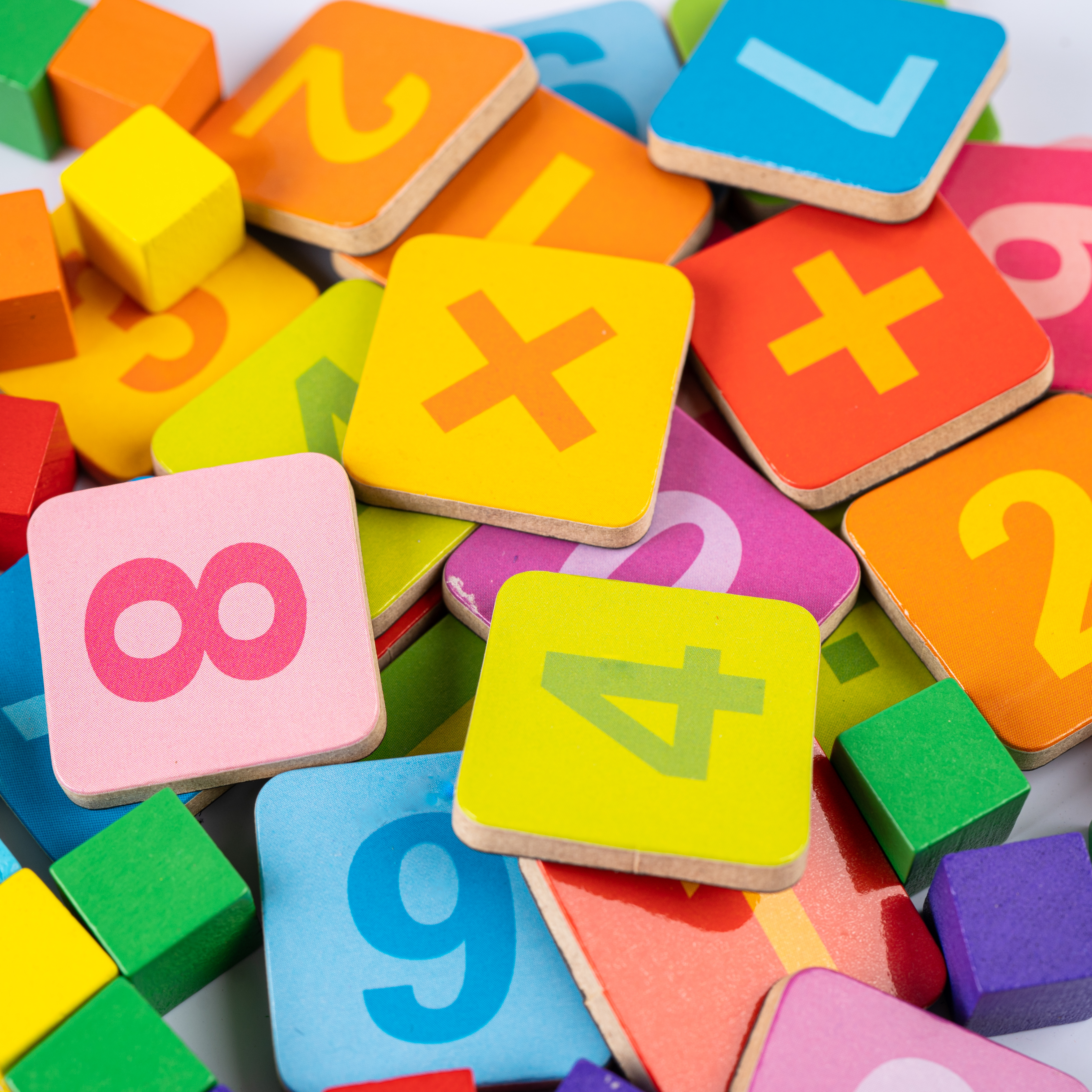 colorful number tiles in pile