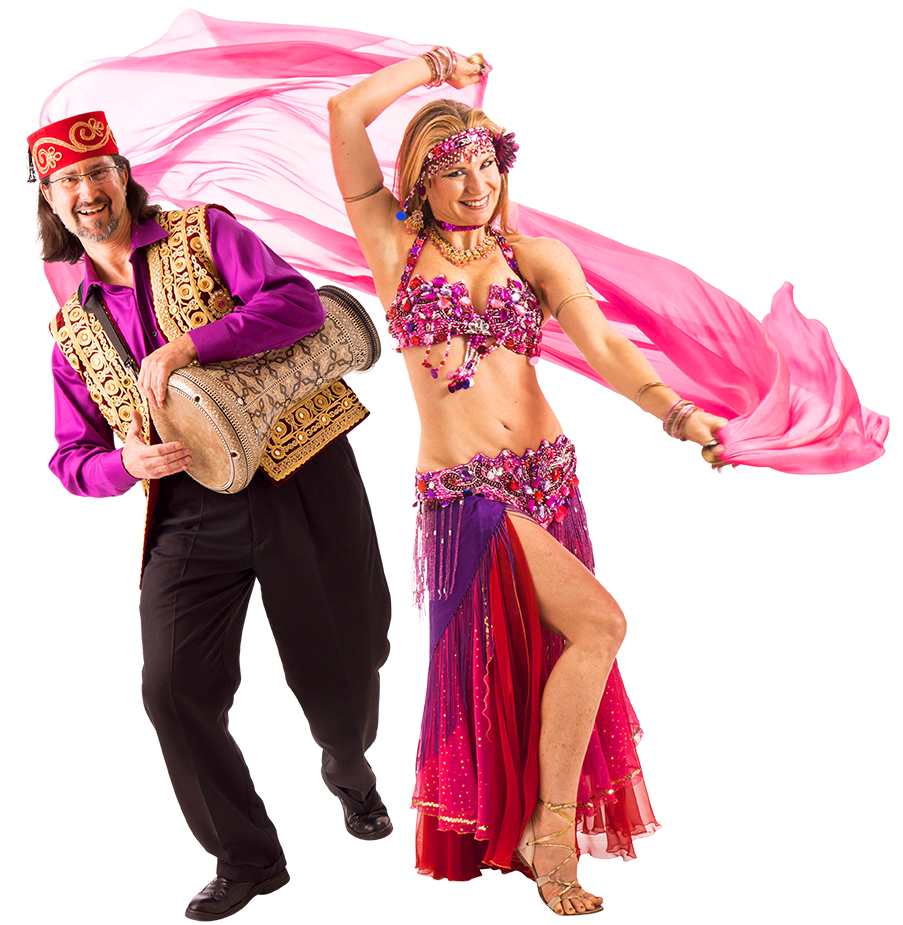 belly dancer Jensuya and drummer Robert Peak in performance costumes smiling at camera