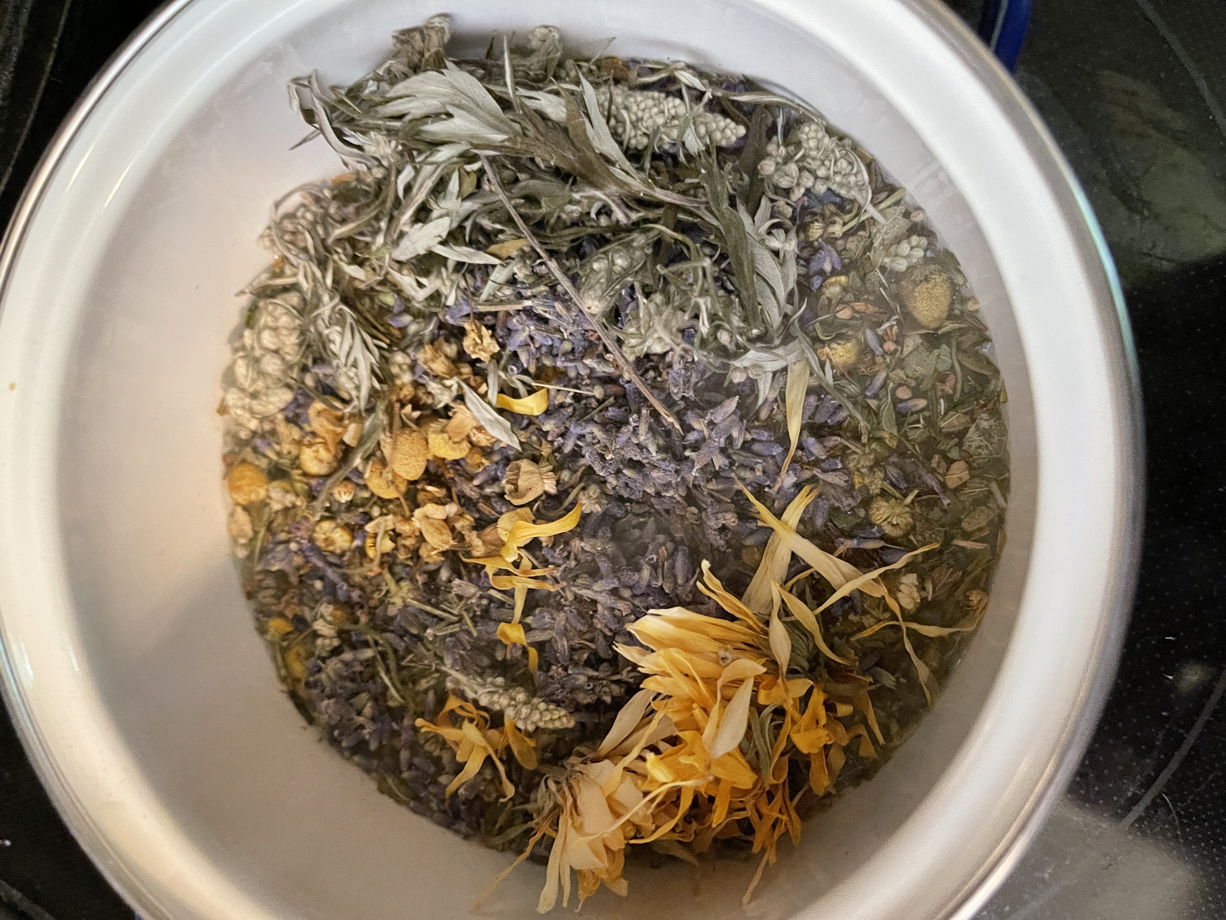 mugwort lavender chamomile herbs in a pot