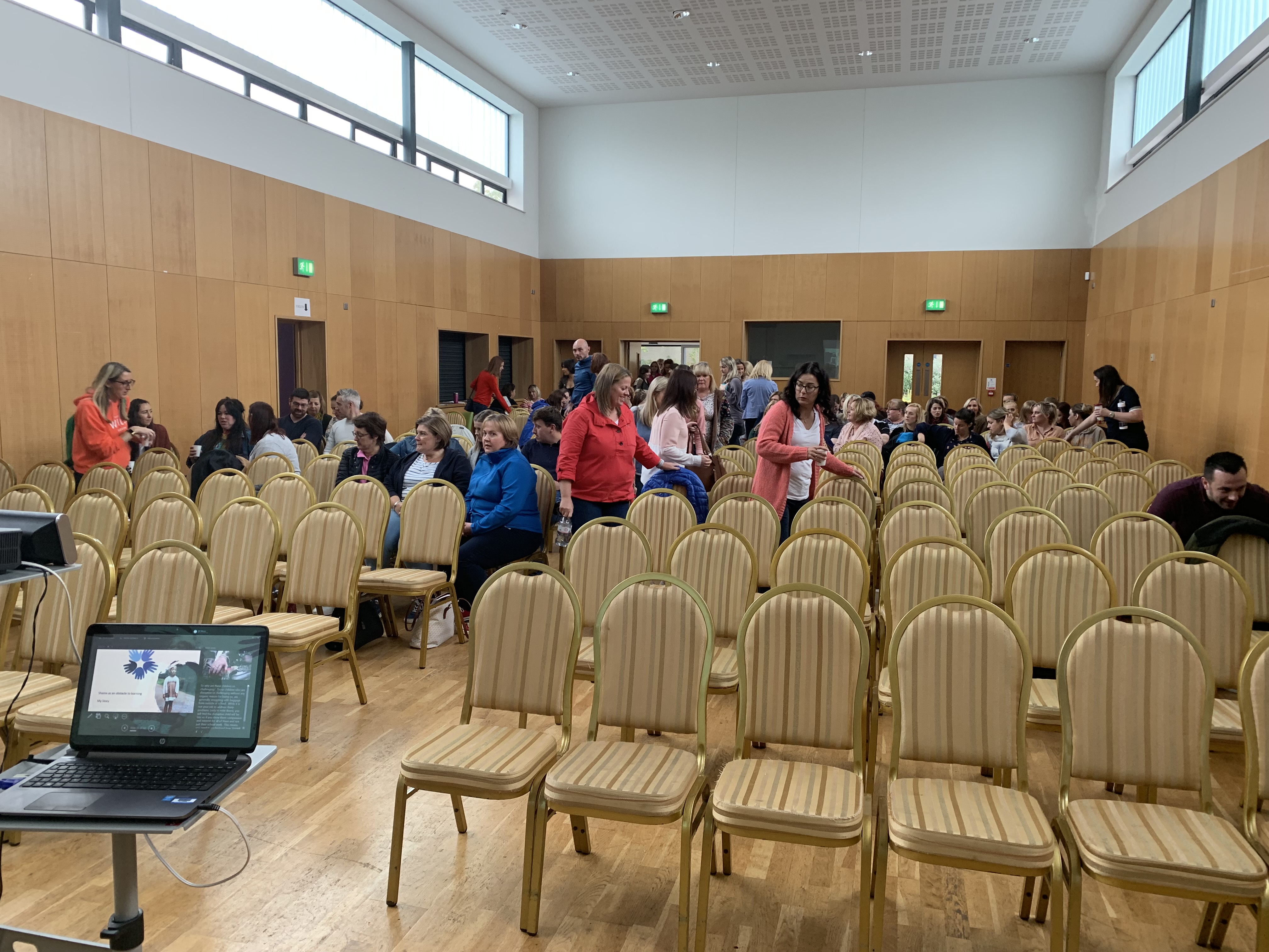 A group of 250 teachers seated to take part in a large group presentation on Restorative Practice in Education Settings