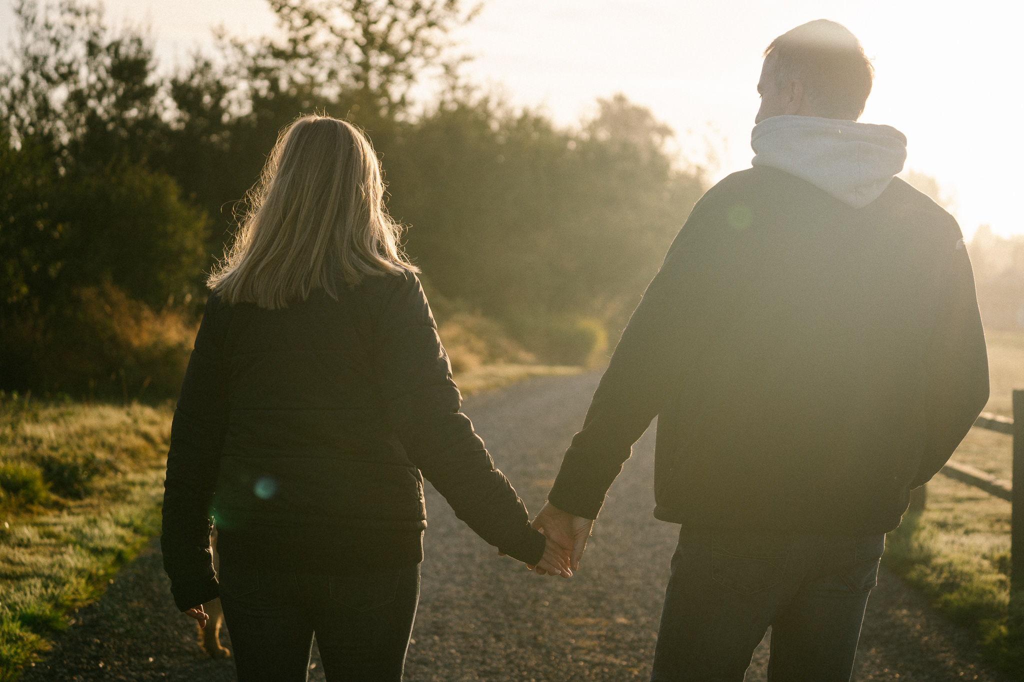 Couple holding hands