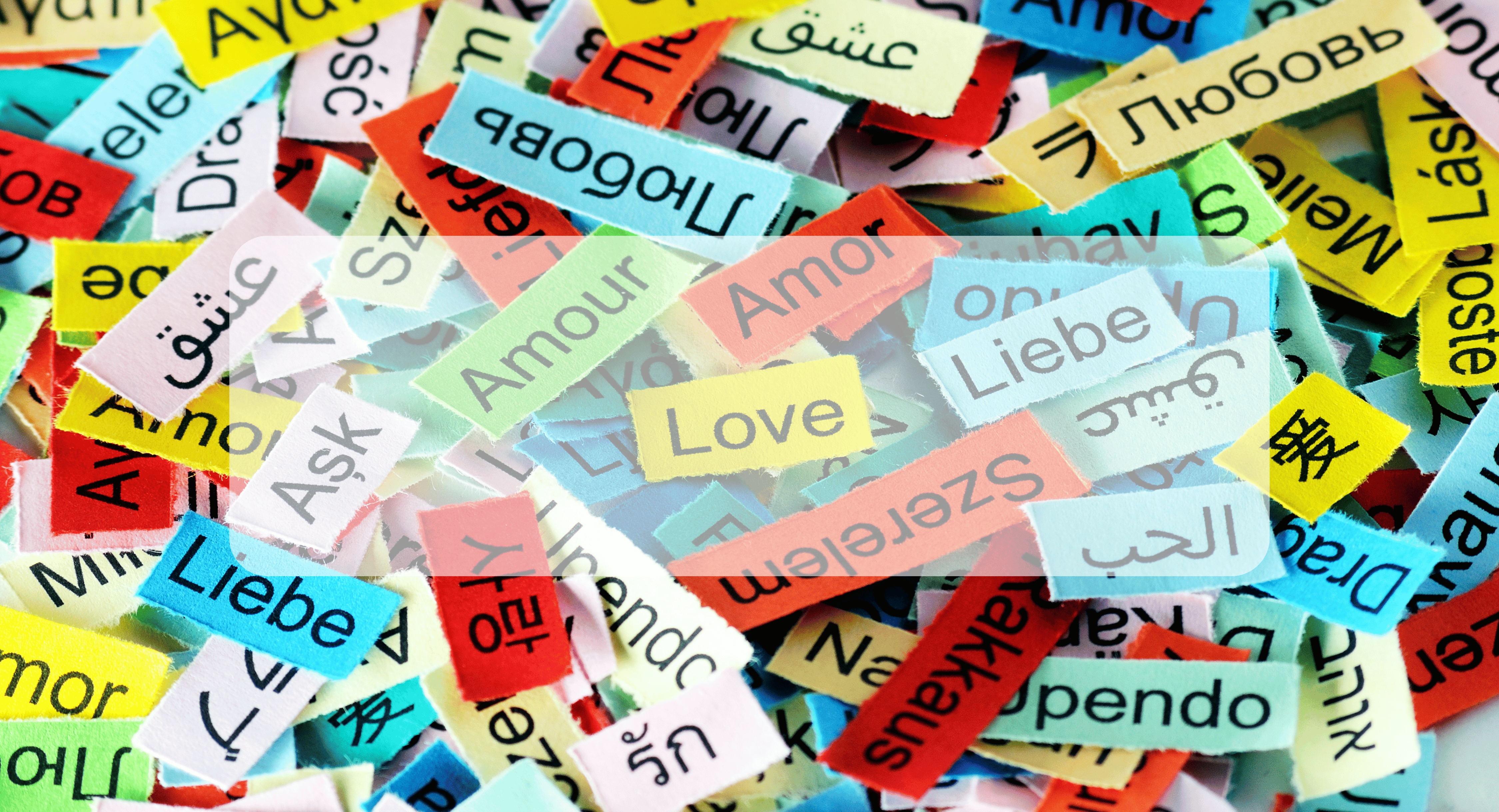 strips of paper that say the word Love in many languages