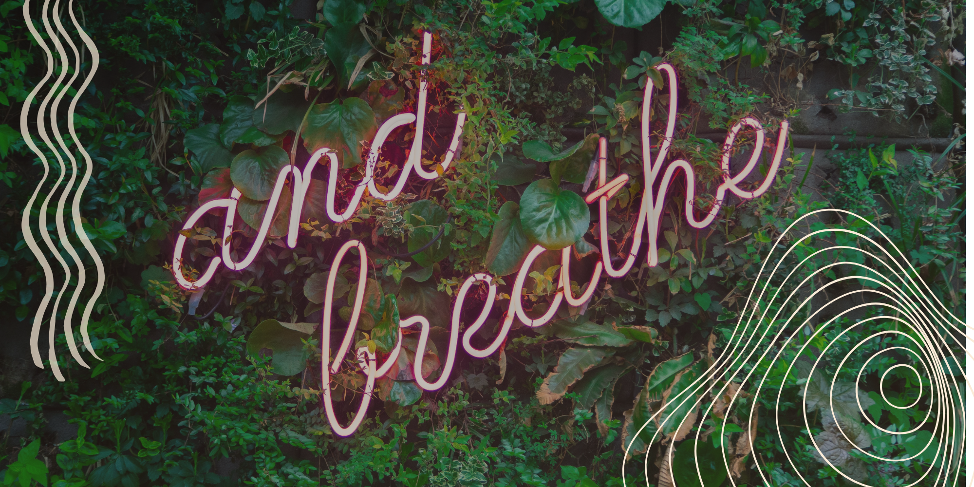 and breathe neon sign in leaves