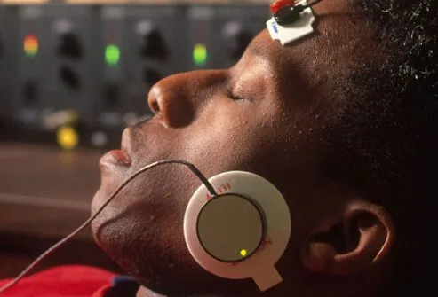 Man undergoing biofeedback monitoring.