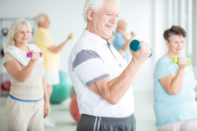 Showing people doing weight training