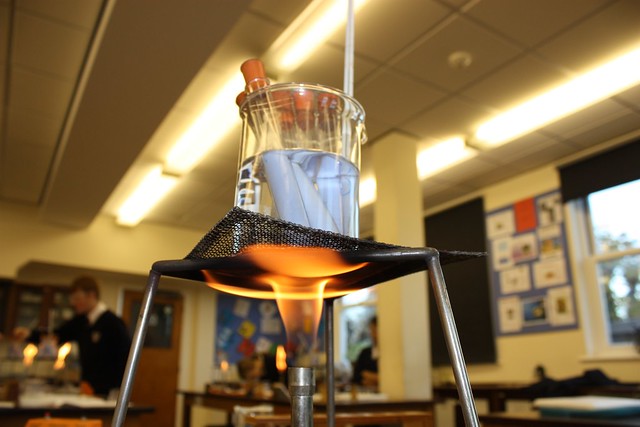 beaker over fire in science lab