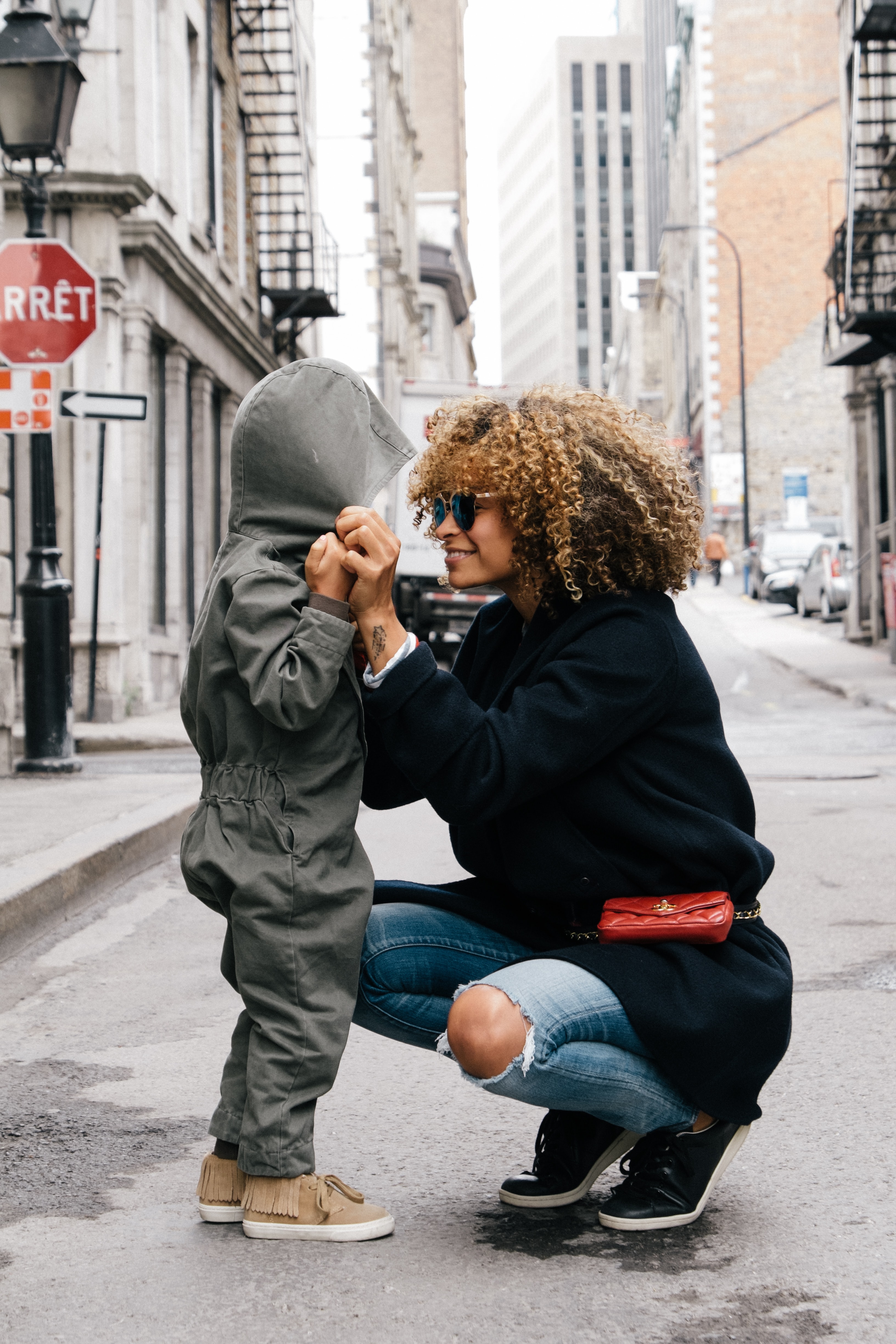 Photo of a baby&#39;s hands holding onto an adult&#39;s.