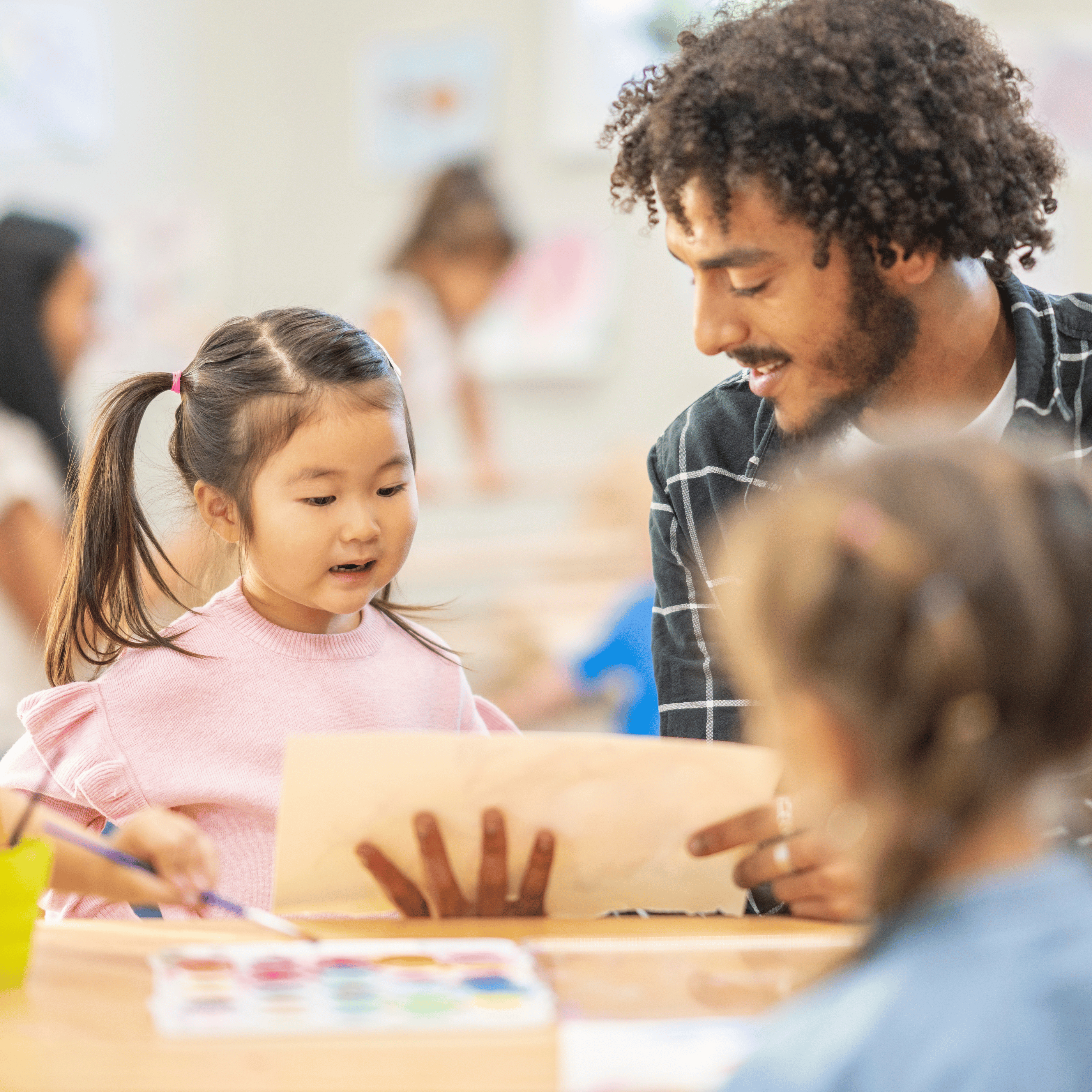 teacher assessing a student with reading skills