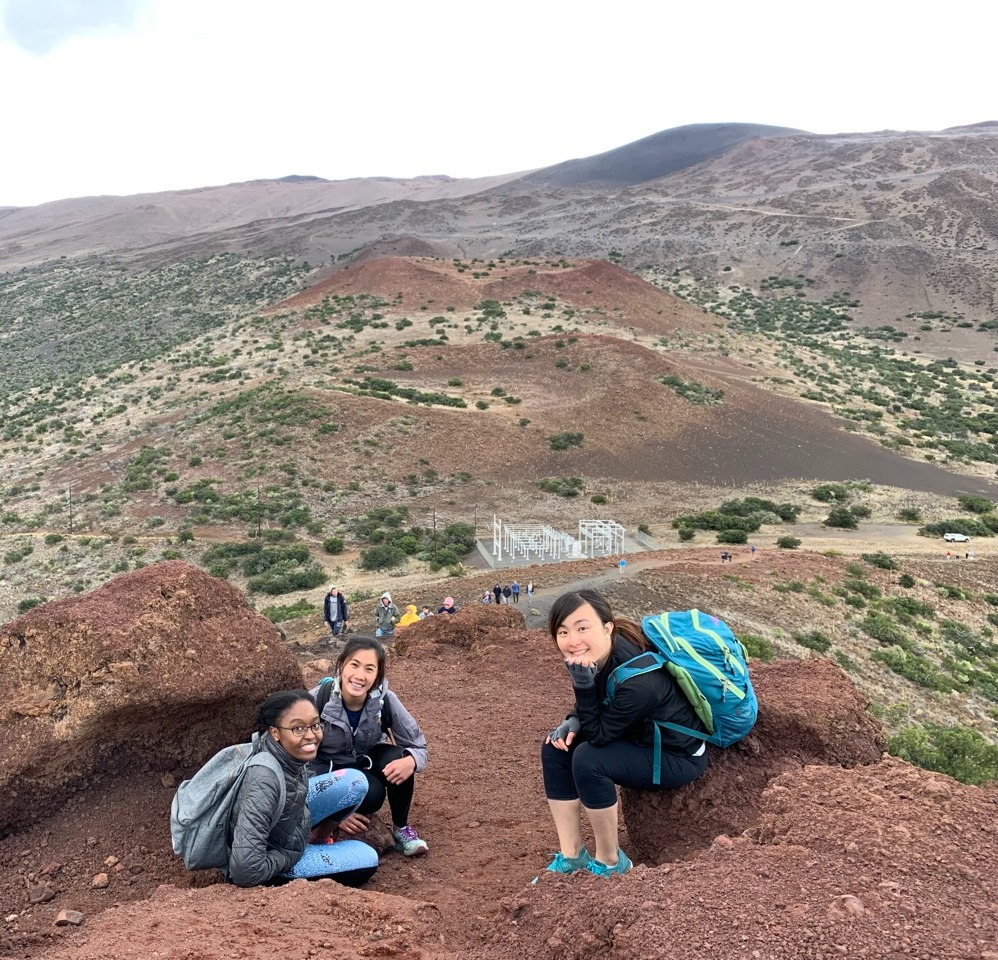 Group of solo female travelers hiking