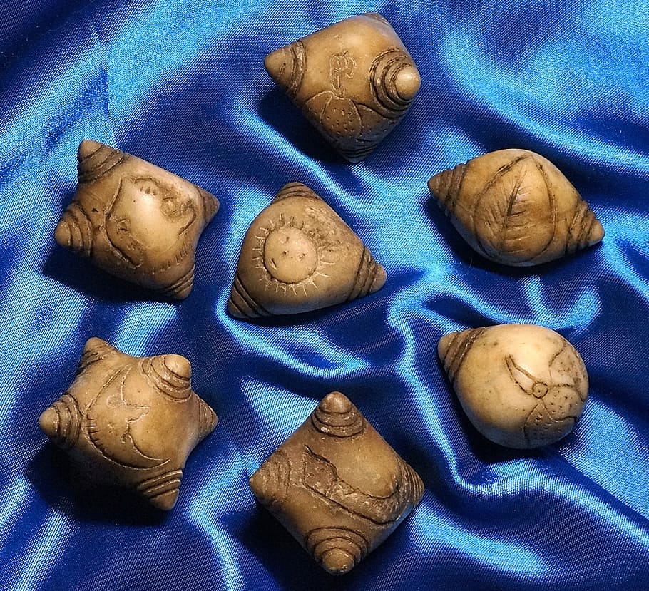 Chunpi stones on a shiny blue cloth