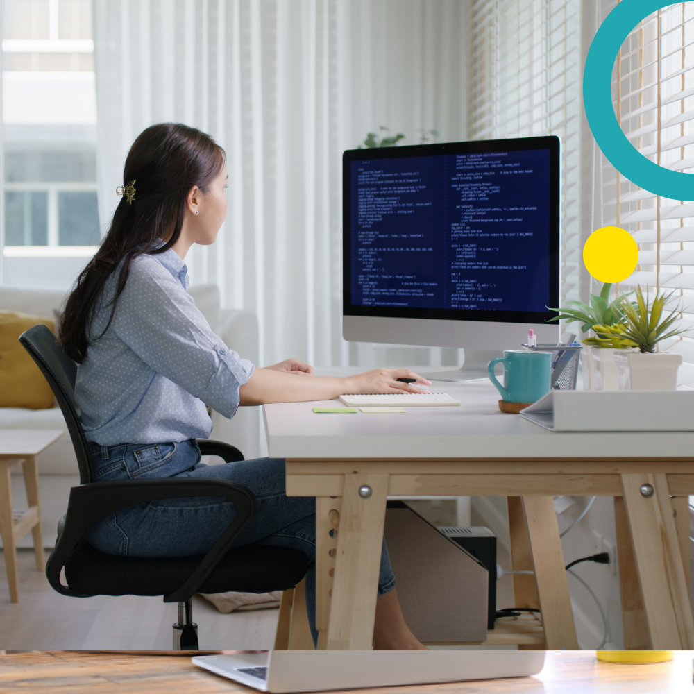 Woman looking at data on a computer