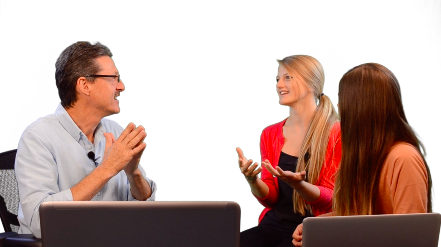 Mike Aston teaching two nieces to trade stocks