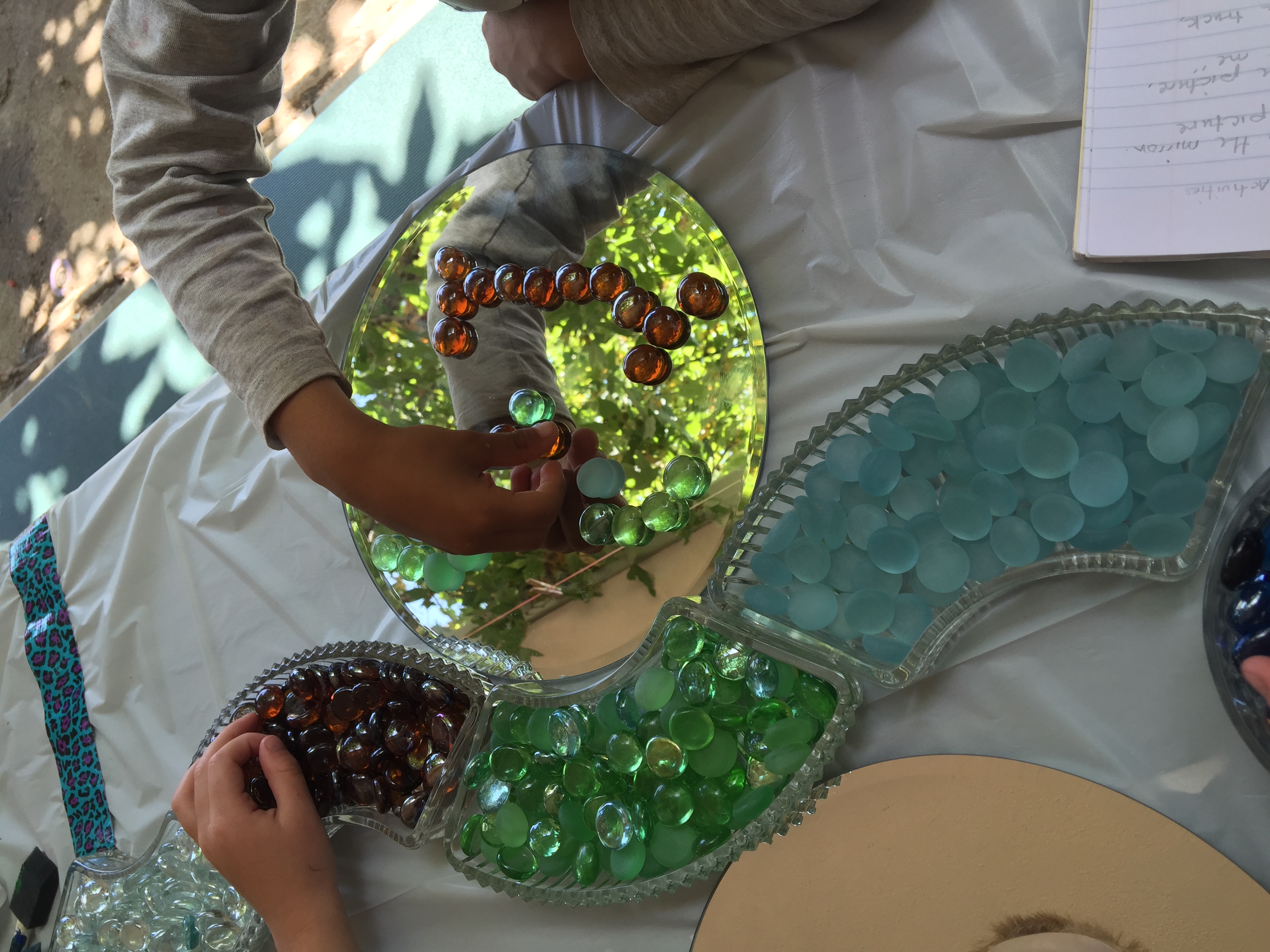 children playing with loose parts