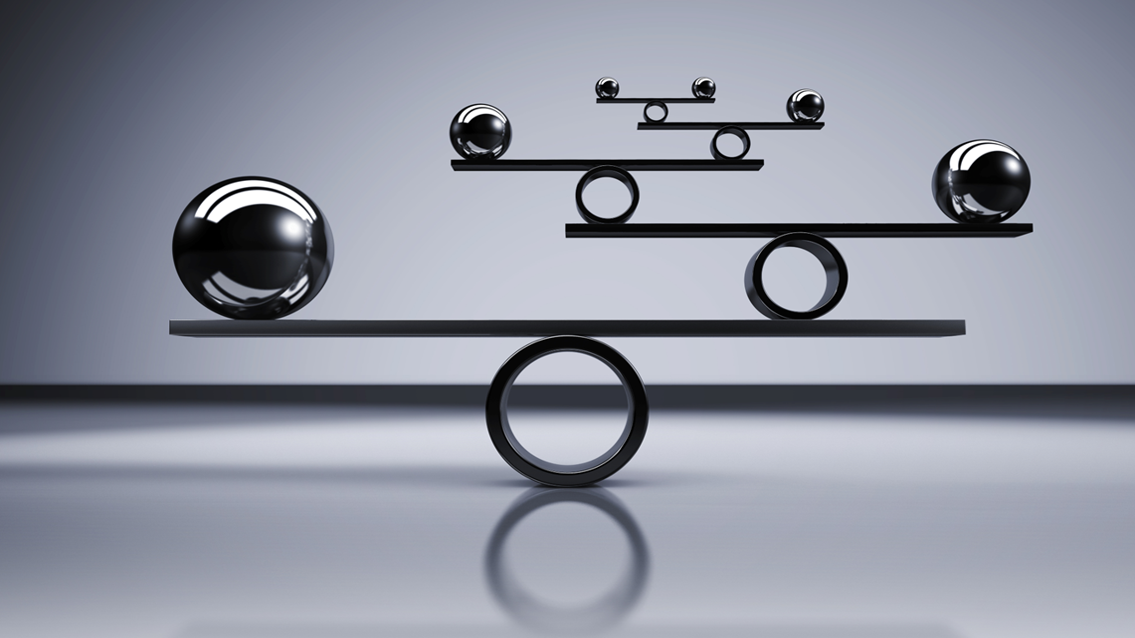 five planks balanced on five rings with a silver ball balanced on alternate ends of each plank