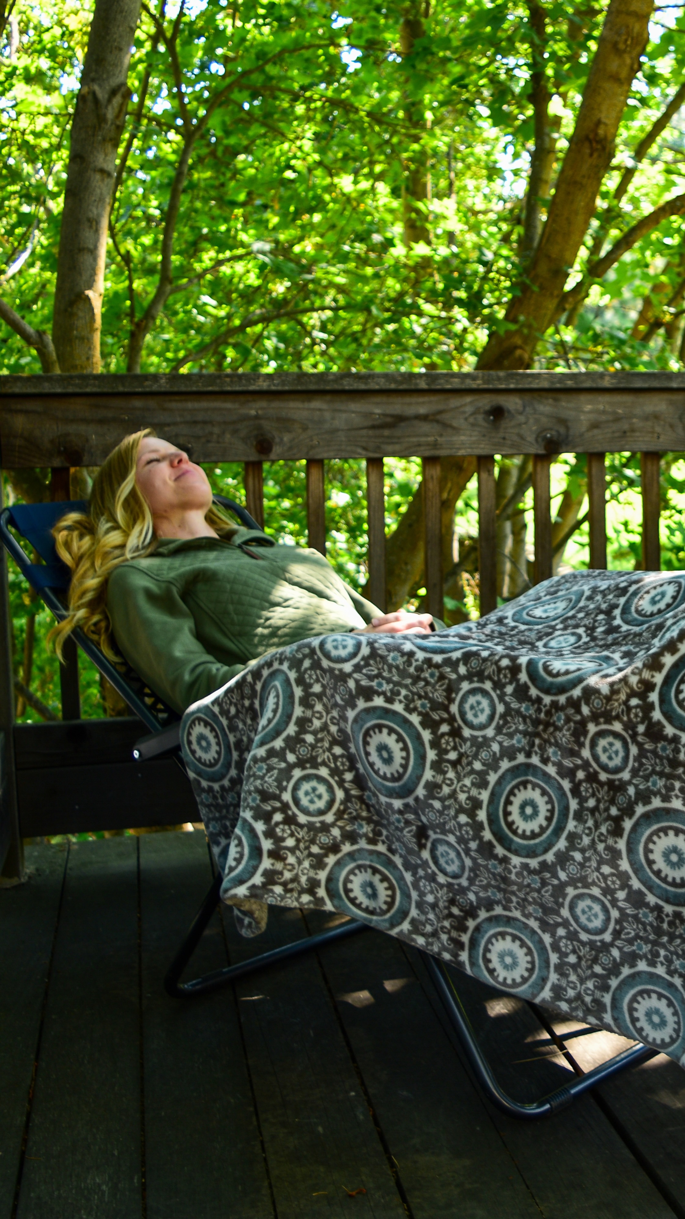woman reclined with blanket