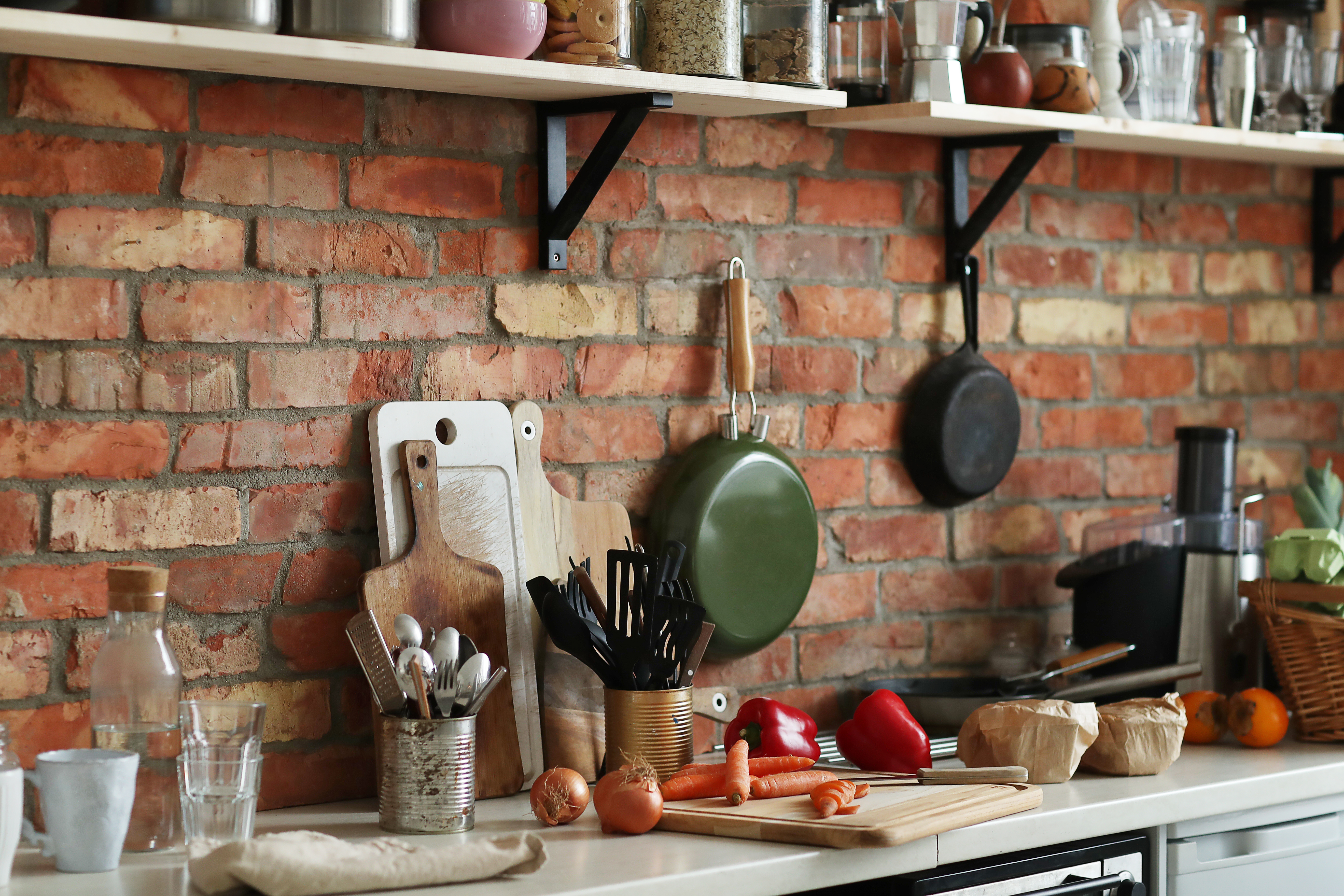 a kitchen scene with pots and pans