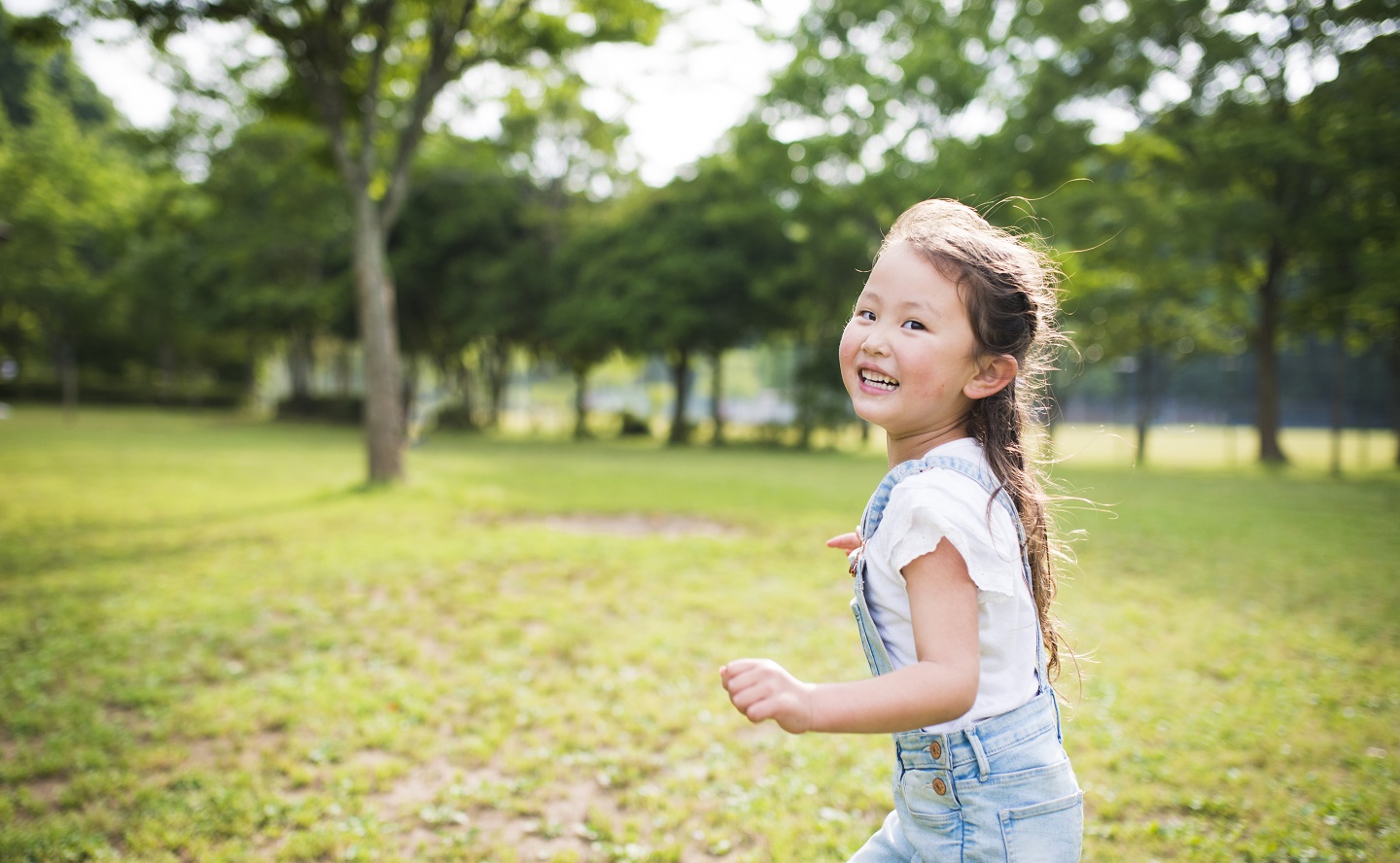 girl running outside child care education