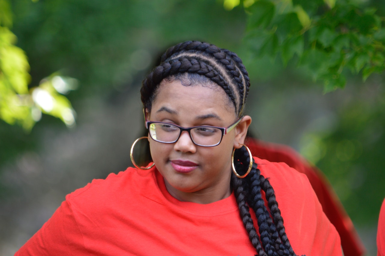 Lady with Dreadlocks on Laptop