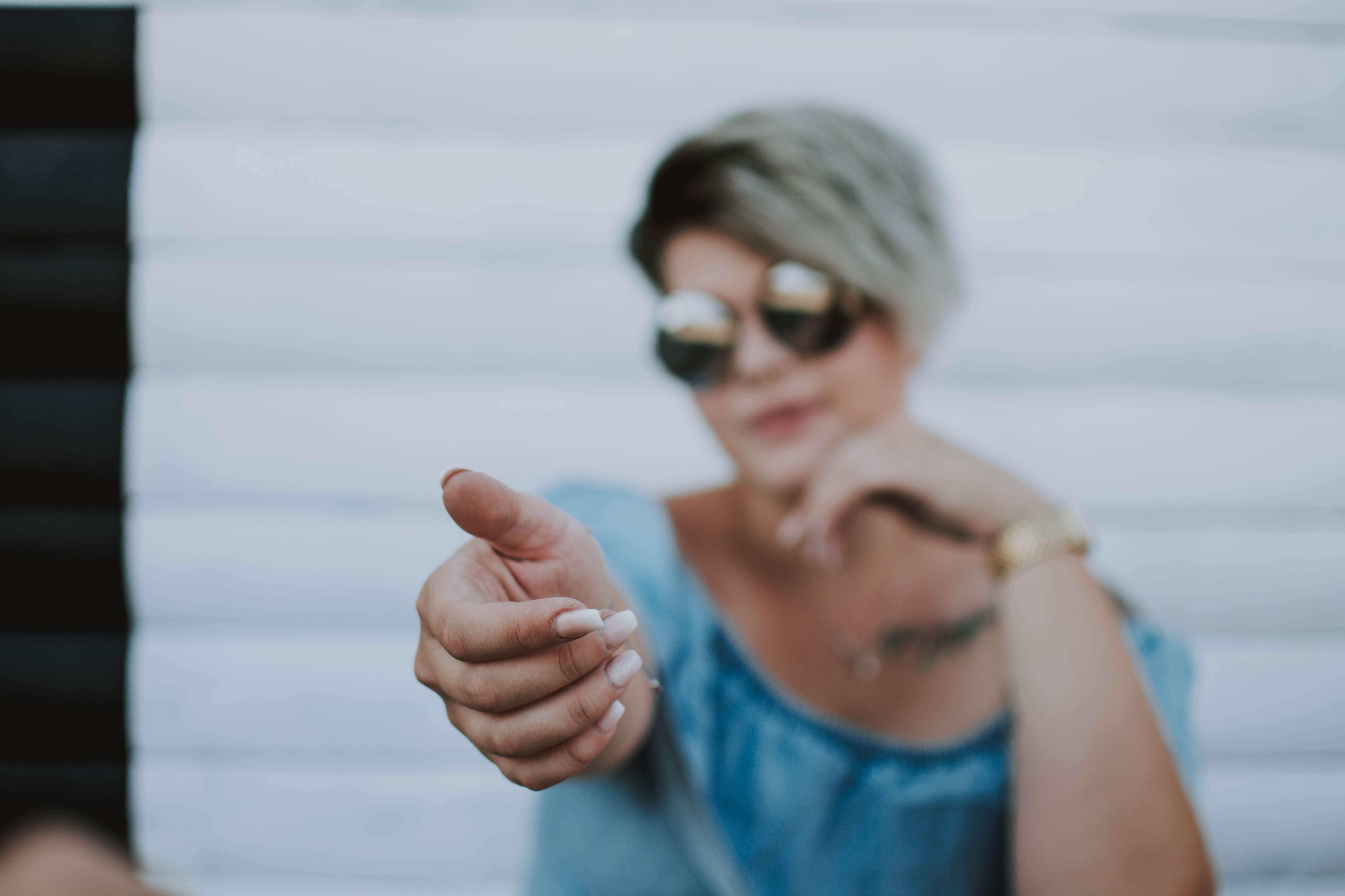 woman reaching out hand