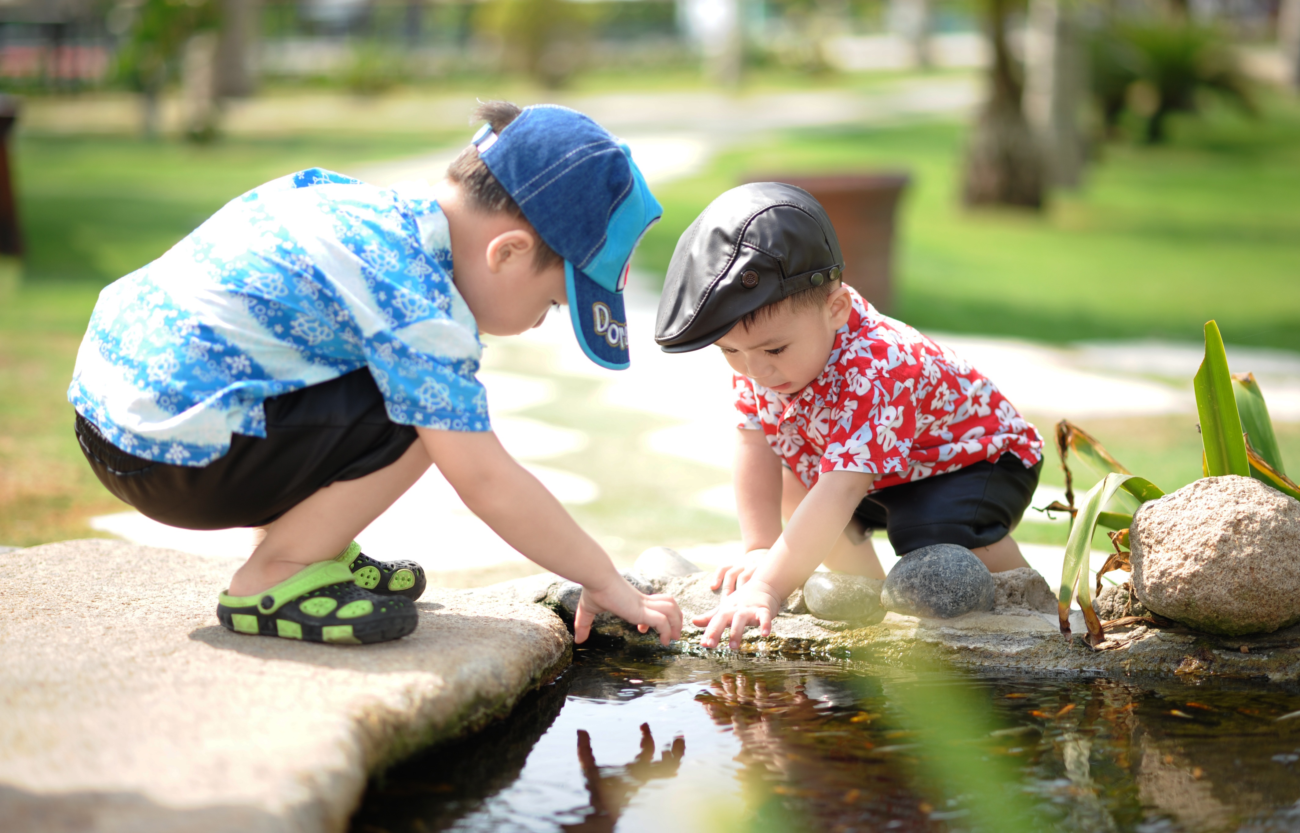 Kids playing in a puddle