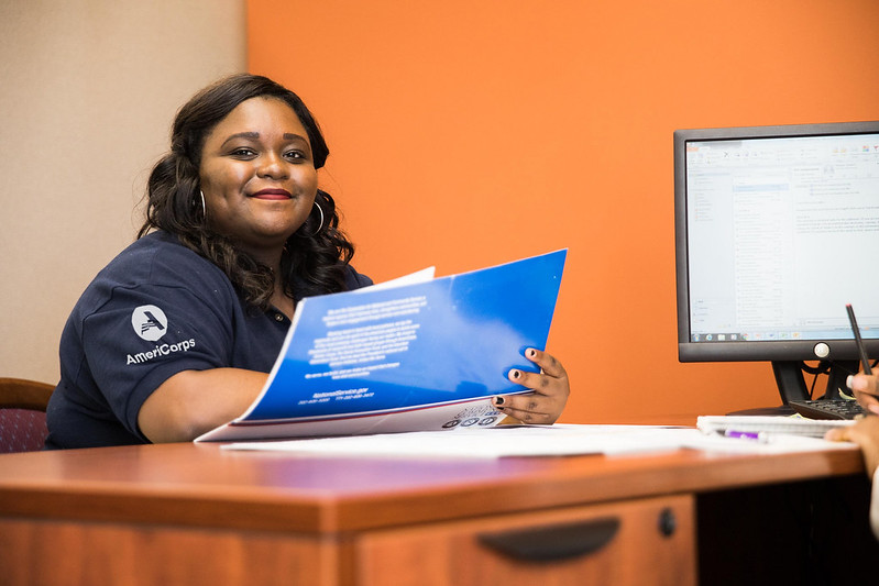 Image of AmeriCorps member at desk