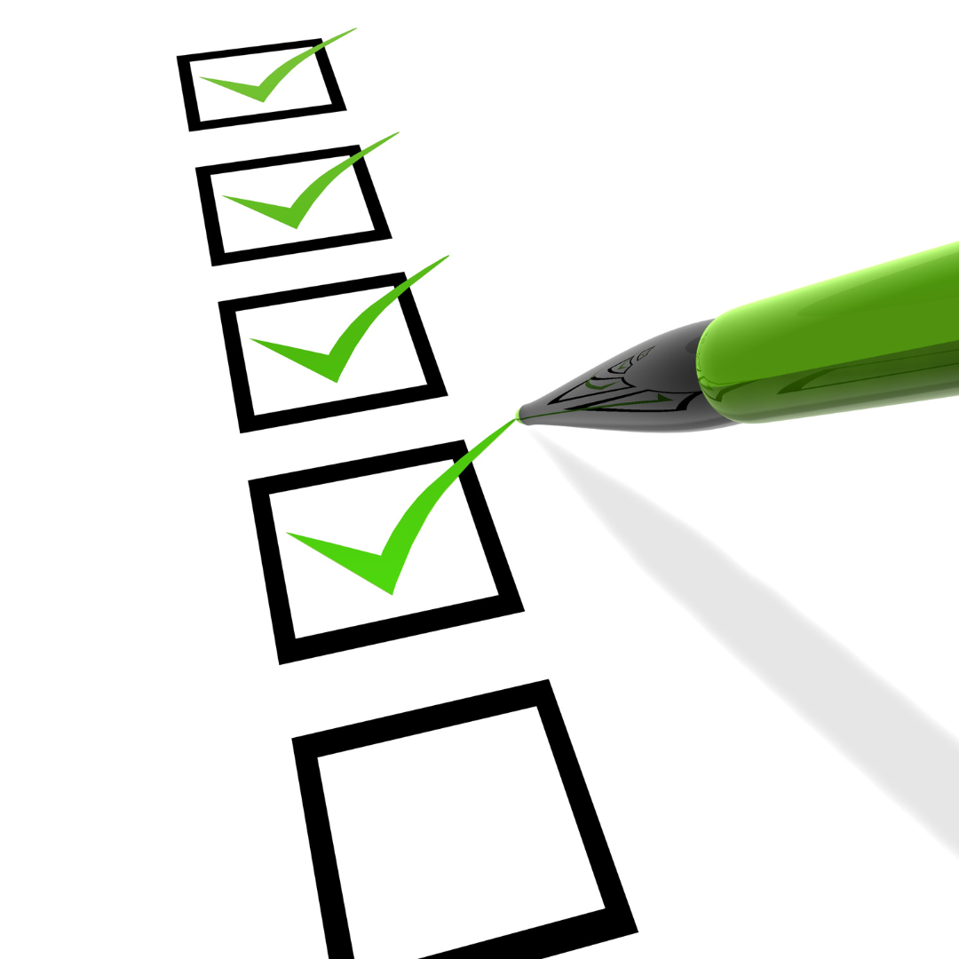 a checklist being ticked in green pen