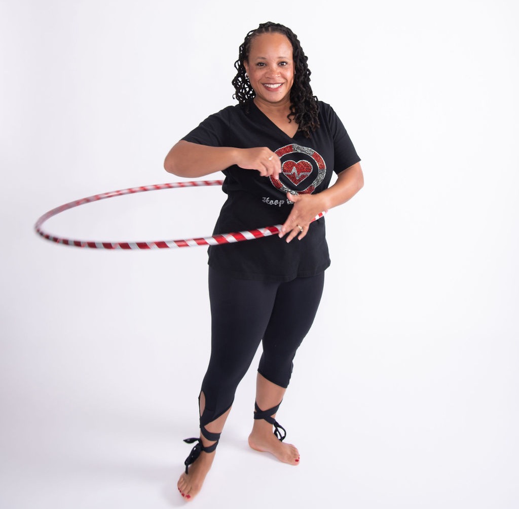 Erica Preston of Hoop to the Rhythm® teaches online hula hoop dance and fitness classes. She streams from Columbus, Ohio to anyone in the world. 