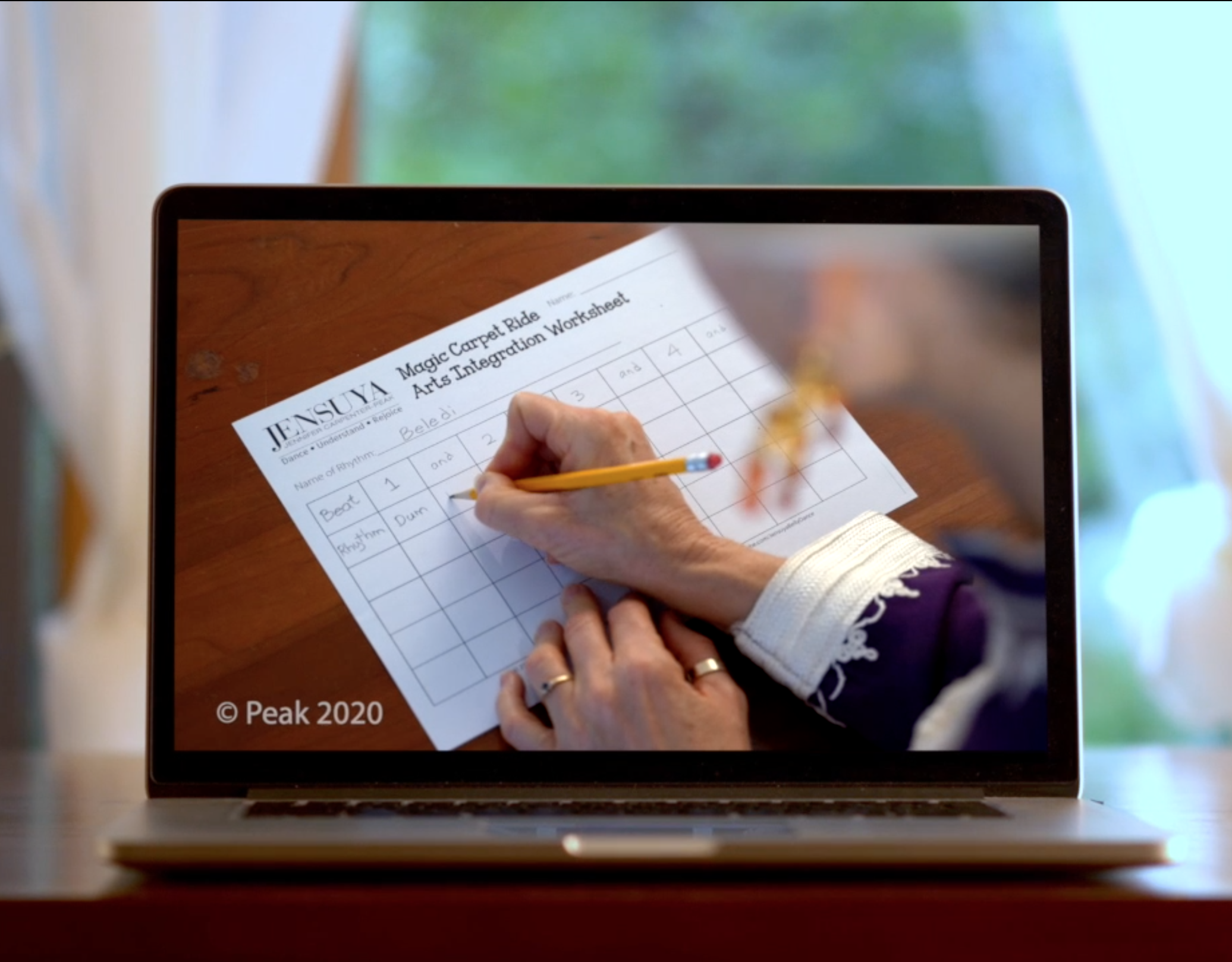 Online course on computer screen showing grade 3 worksheet in virtual school program.