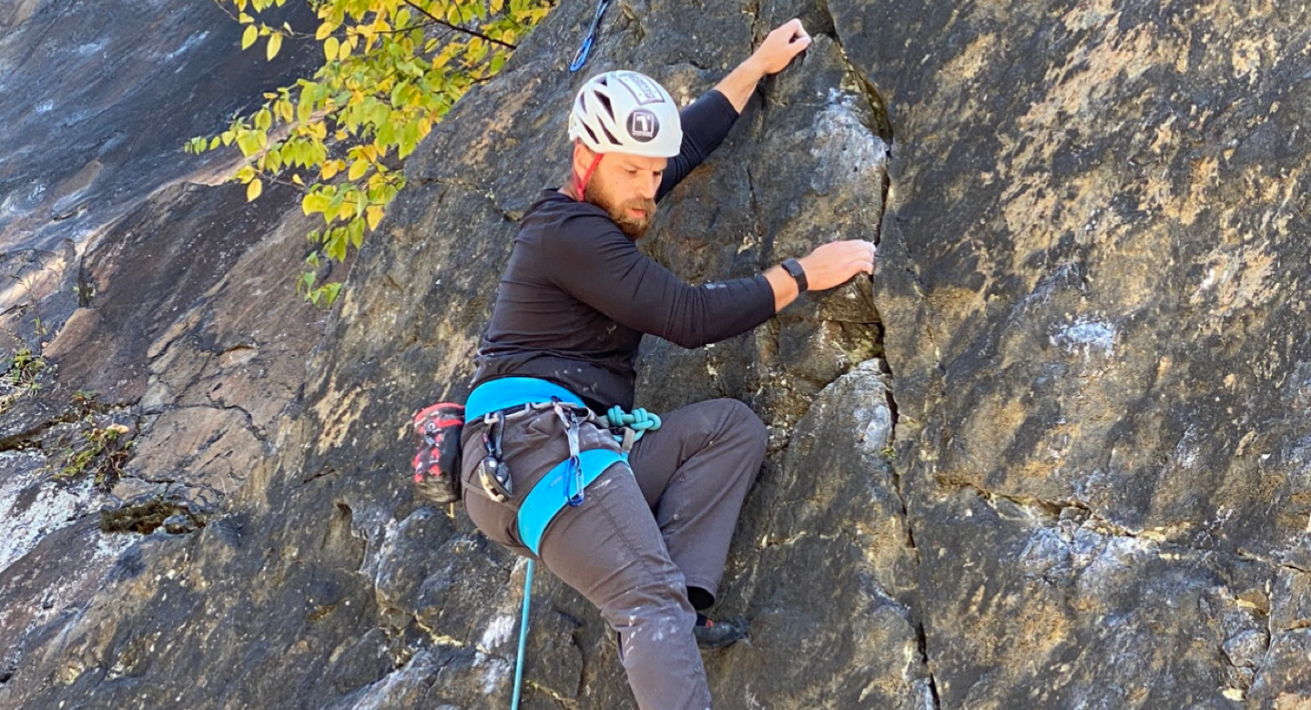 Collin McGee rock climbing